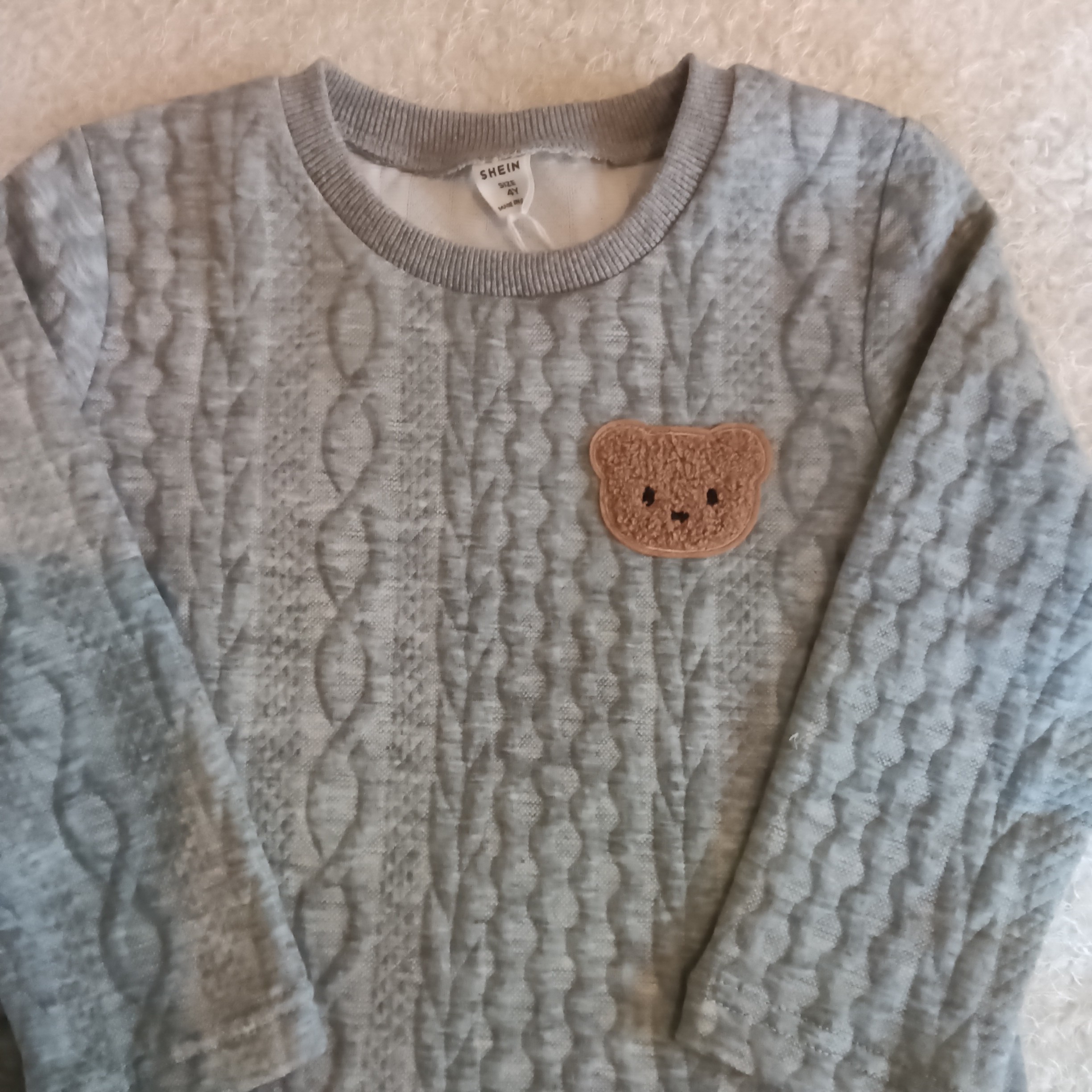 Pull gris.             1159 2